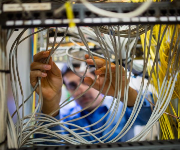 technician-fixing-cable